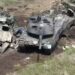 Uszkodzony Leopard 2A6 pośród BWP Bradley