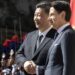 Xi Jinping, prezydent Chin i Giuseppe Conte, premier Włoch, ściskają dłonie przed podpisaniem protokołu ustaleń w sprawie chińskiej inicjatywy Pasa i Szlaku w Villa Madama w Rzymie, 23 marca 2019 roku, aut. Alessia Pierdomenico/Bloomberg